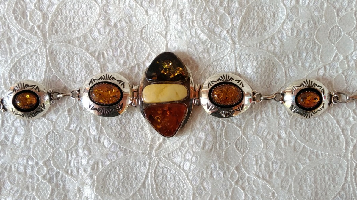 Arnold and Carleena Goodluck Navajo Sterling Silver and Amber