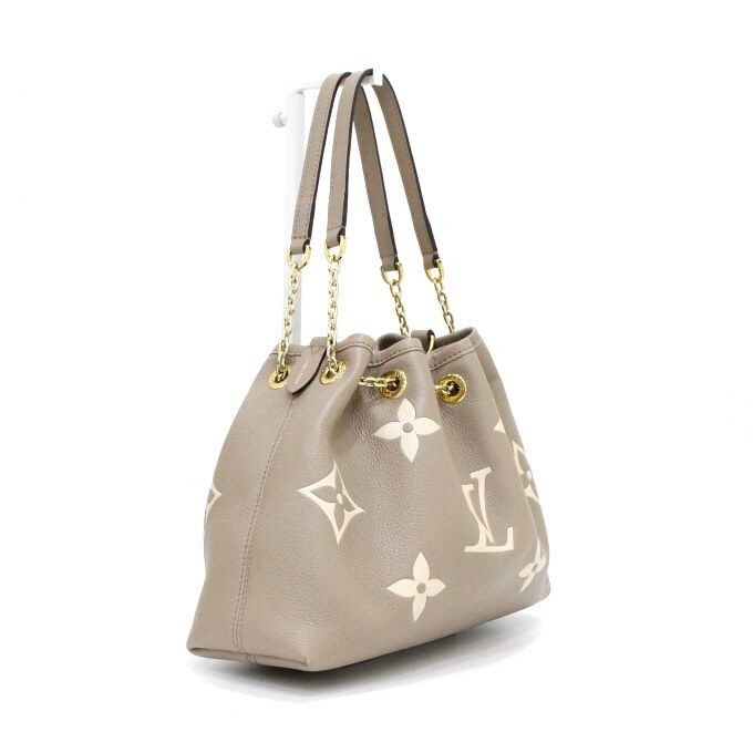 Louis Vuitton Monogram Empreinte Drawstring LV Bu… - image 4