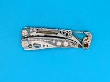 LEATHERMAN Skeletool Multi Tool - Combo Edge Blade Knife Pliers Carabiner! USED