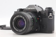 N.MINT Canon AE-1 Program Black 35mm SLR NFD 35-70mm F3.5-4.5 Lens From JAPAN