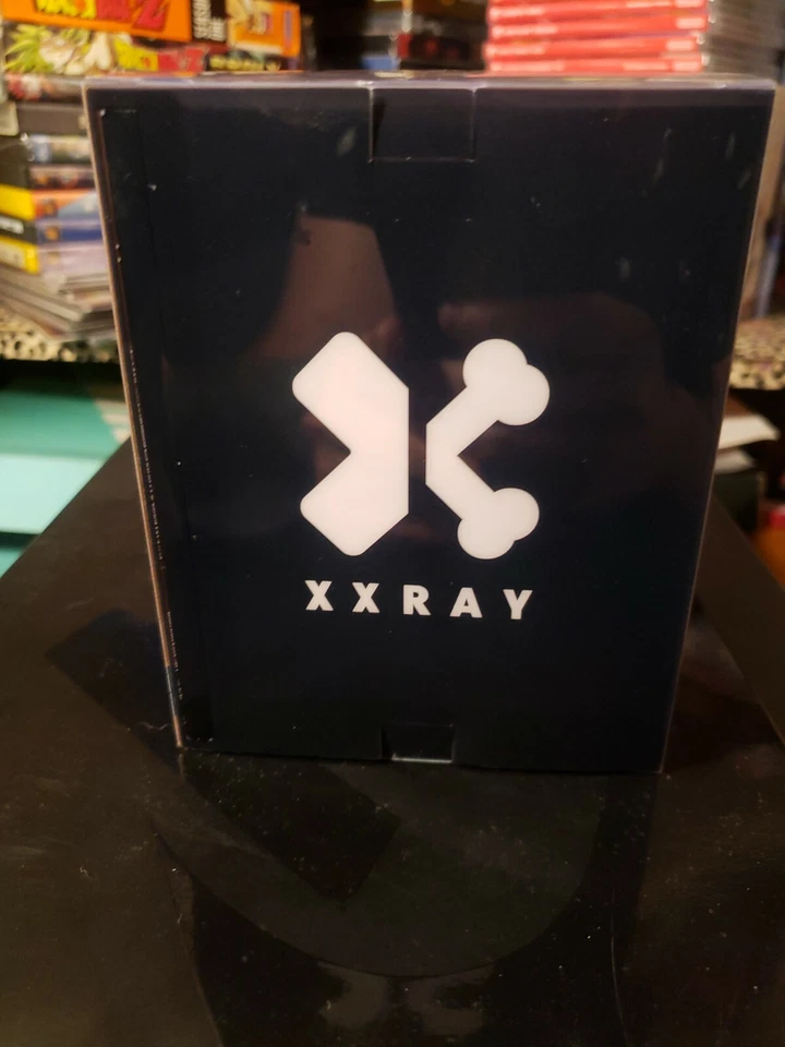 Figura de arte de vinilo XXRAY Looney Tunes Pato Lucas visión 4D por Jason Freeny Foto 4 de 4