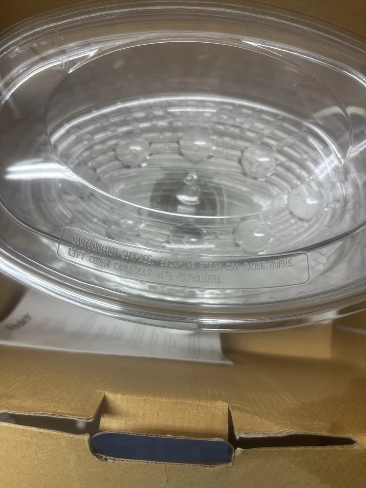 Olla de vapor y arroz Oster de dos niveles modelo #5711 Foto 2 de 4