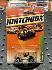 2010 Matchbox Jungle Explorers Jeep Willys TAN #96 New on Card