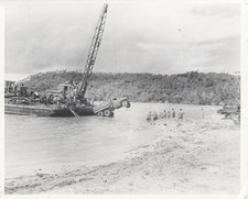 ORIGINAL MARINES CORPS PHOTOGRAPH OF MARINES IN UNIFORM LANDING ON ISLAND