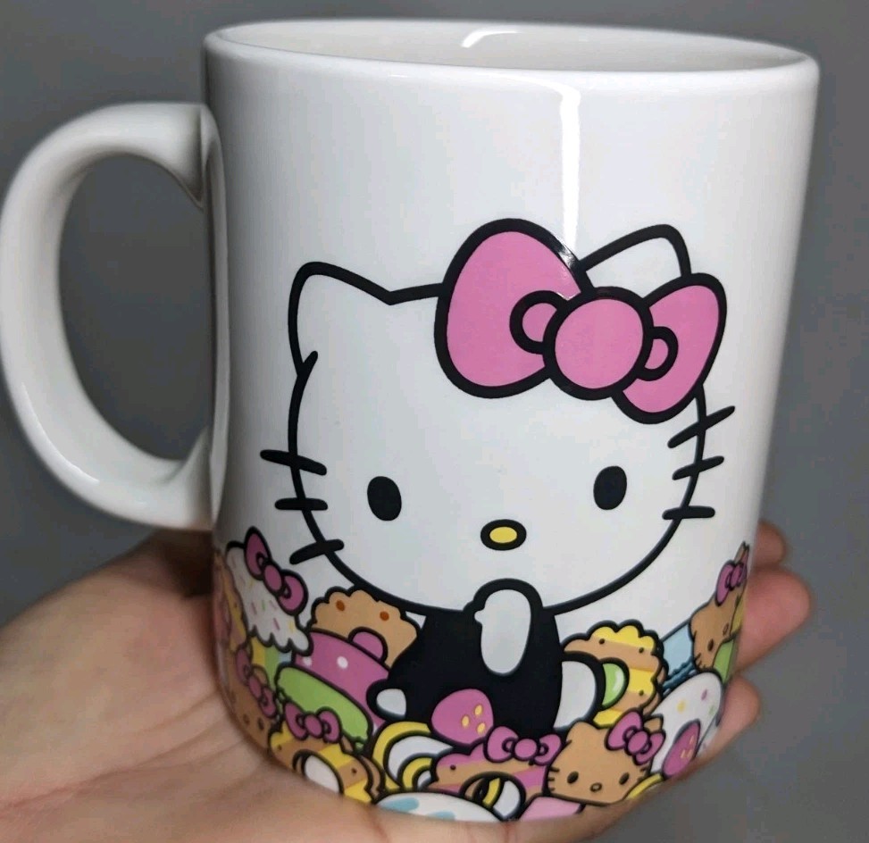 Taza de café Hello Kitty Café exclusiva con lazo rosa donuts galletas taza Sanrio