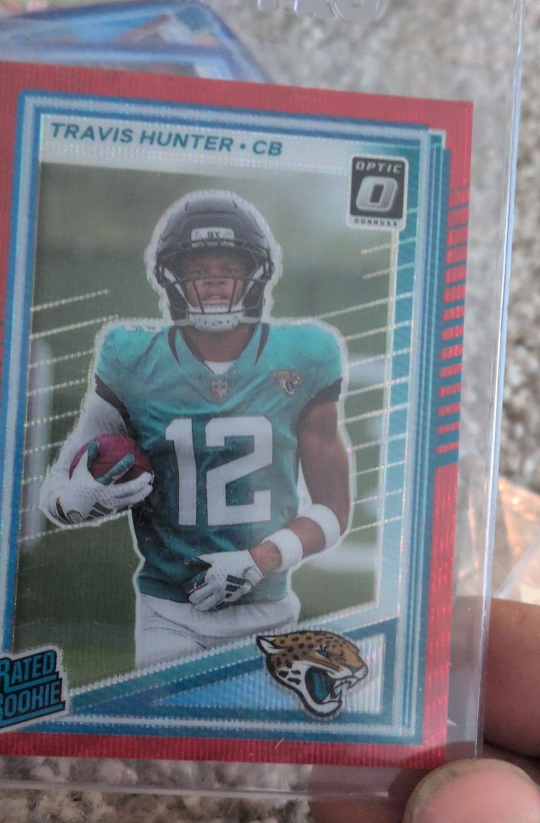 2025 Panini Donruss - Rated Rookie Travis Hunter #301 Optic Preview Red Pandora