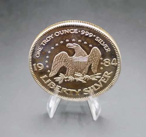 Vintage 1984 A-Mark Eagle Liberty Bell 999 Fine Silver One Troy Ounce