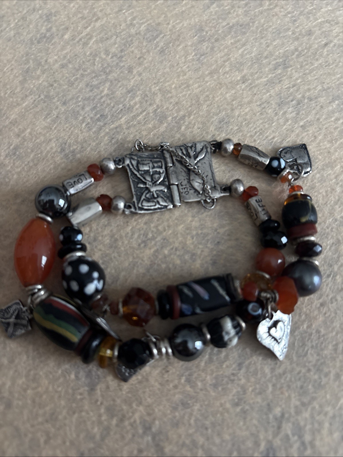 Jes Maharry Silver Charm Bracelet With Orange And Black Stones With Book Clasp