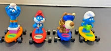 Lot of 4 Hardees Smurfs on Skateboards Peyo Applause 1990