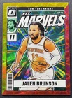 Jalen Brunson 2024-25 Panini Donruss Optic 25/99 Red Gold Choice Net Marvels #22