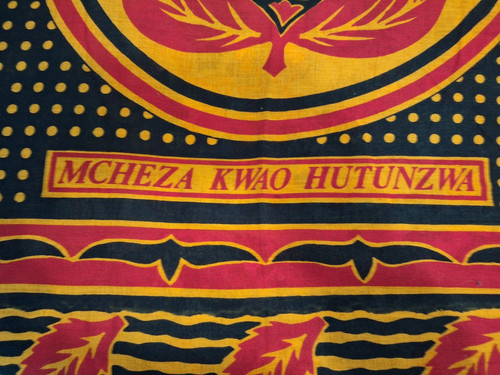 African Kanga Cloth Swahili Saying Mcheza Kwao Hutuinzwa Black Red Yellow 64x44"