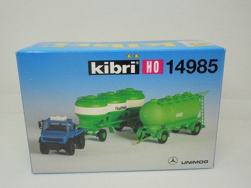 Kibri H0 14985 MB Unimog con 2 rimorchi per silos Raiffeisen - nuovo - Foto 1 di 1