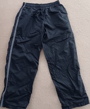 Vintage NIKE Men's Lined Windbreaker Nylon Track Pants in Black Size Large