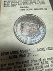 TIDY HOUSE CARD WITH THE ORIGINAL 1888-P SILVER MORGAN DOLLAR TONED TONER