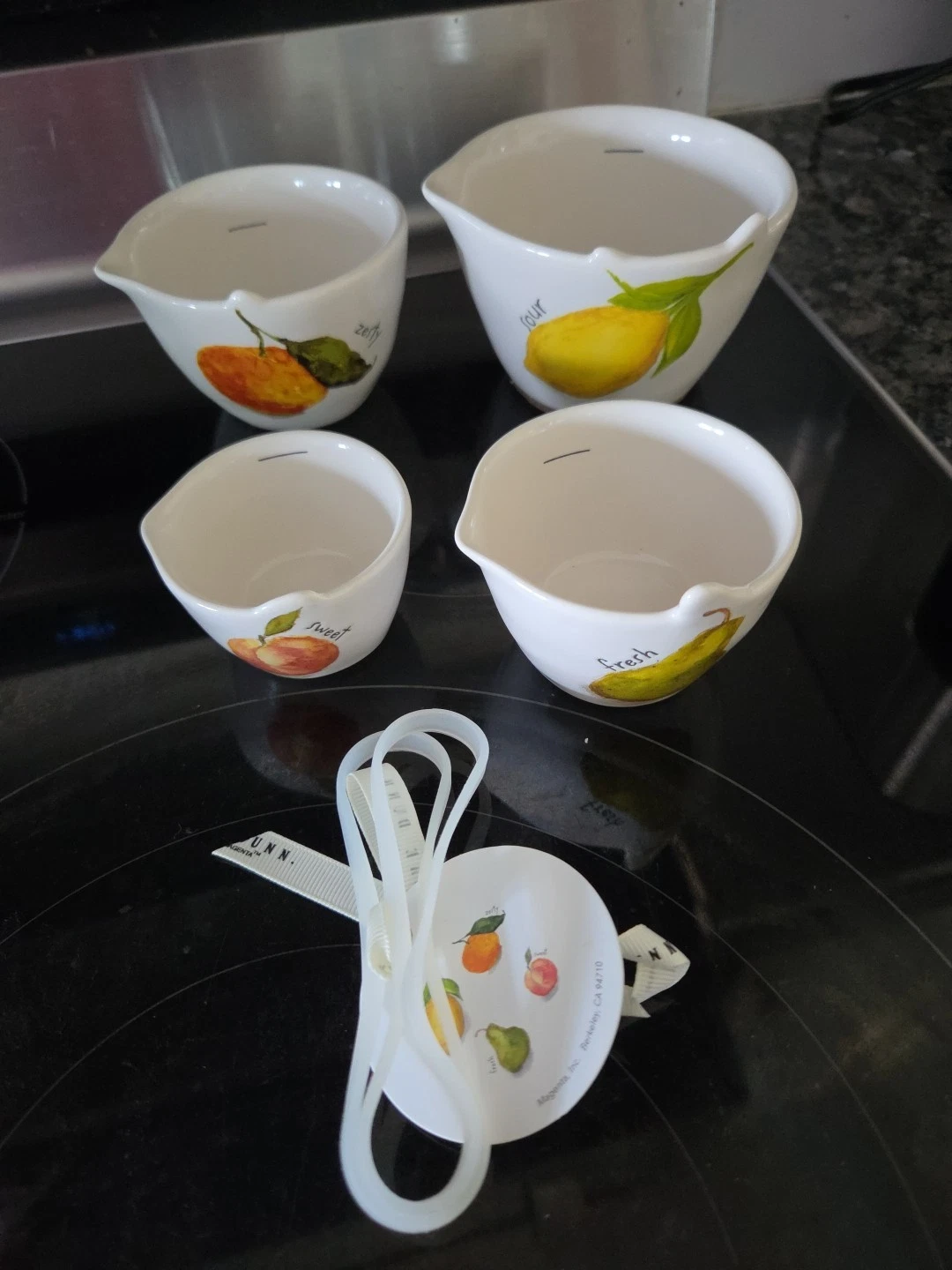 Rae Dunn Lemon Peach Pear Orange Measuring Cups Set New
Opens in a new window or tab
