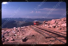 sl65  Original slide  1975 Colorado tram in motion 557a