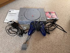 SONY PLASTATION ONE COSOLE WITH ALL WIRES , CONTROLLER AND 1 GAME AND MEMORY CRD