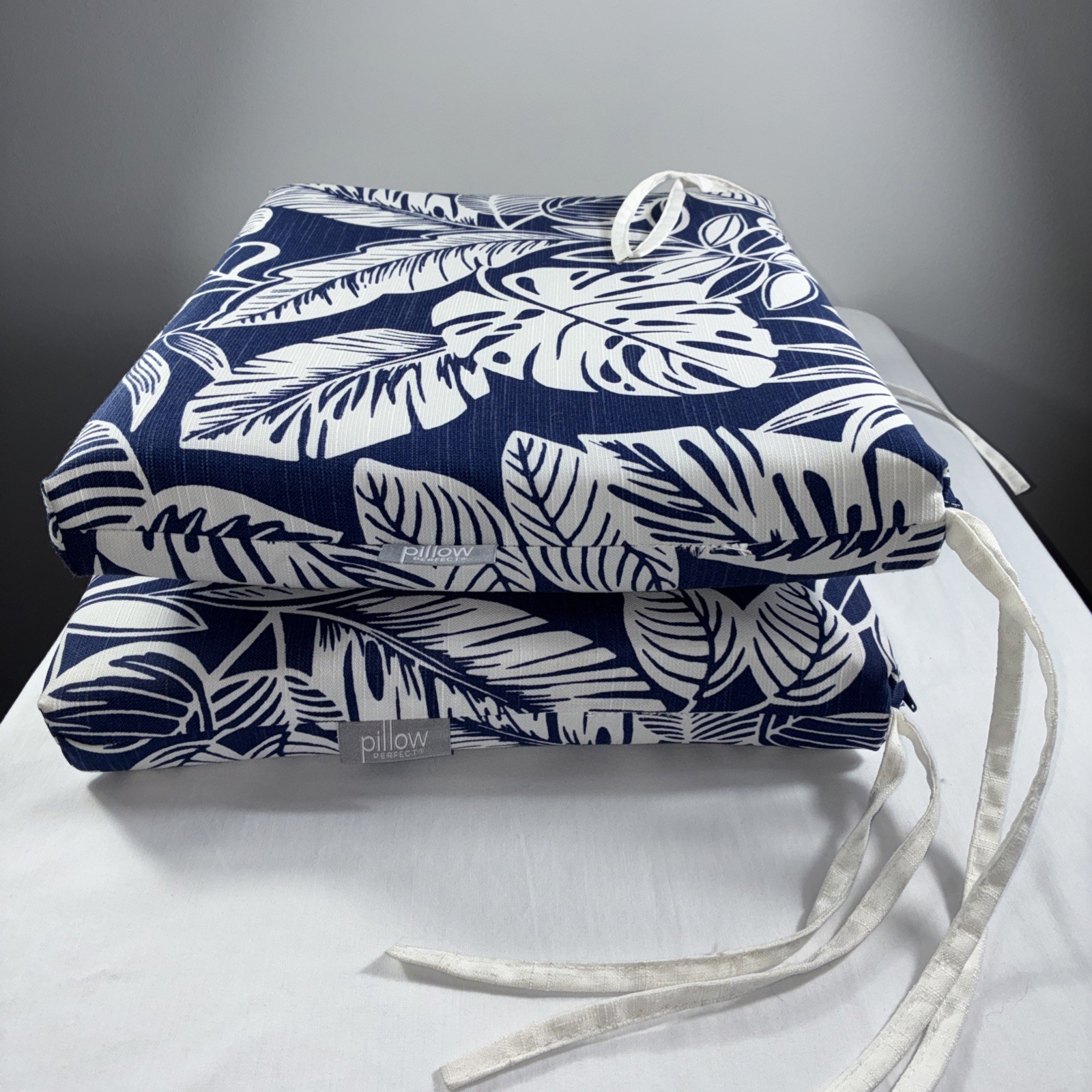 Pillow Perfect Delray Navy Squared Corners Seat Cushion (Set