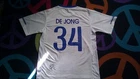 NIGEL DE JONG SIGNED NETHERLANDS REPLICA SOCCER JERSEY