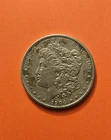 MORGAN SILVER DOLLAR (1)