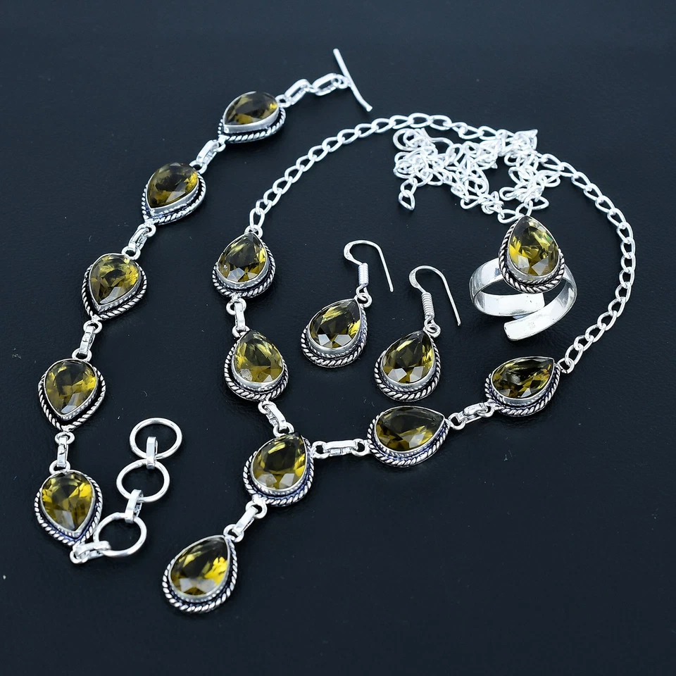 Juego de cuatro piezas de joyería de plata de ley 925 hecho a mano con piedras preciosas de topacio ahumado Foto 3 de 4
