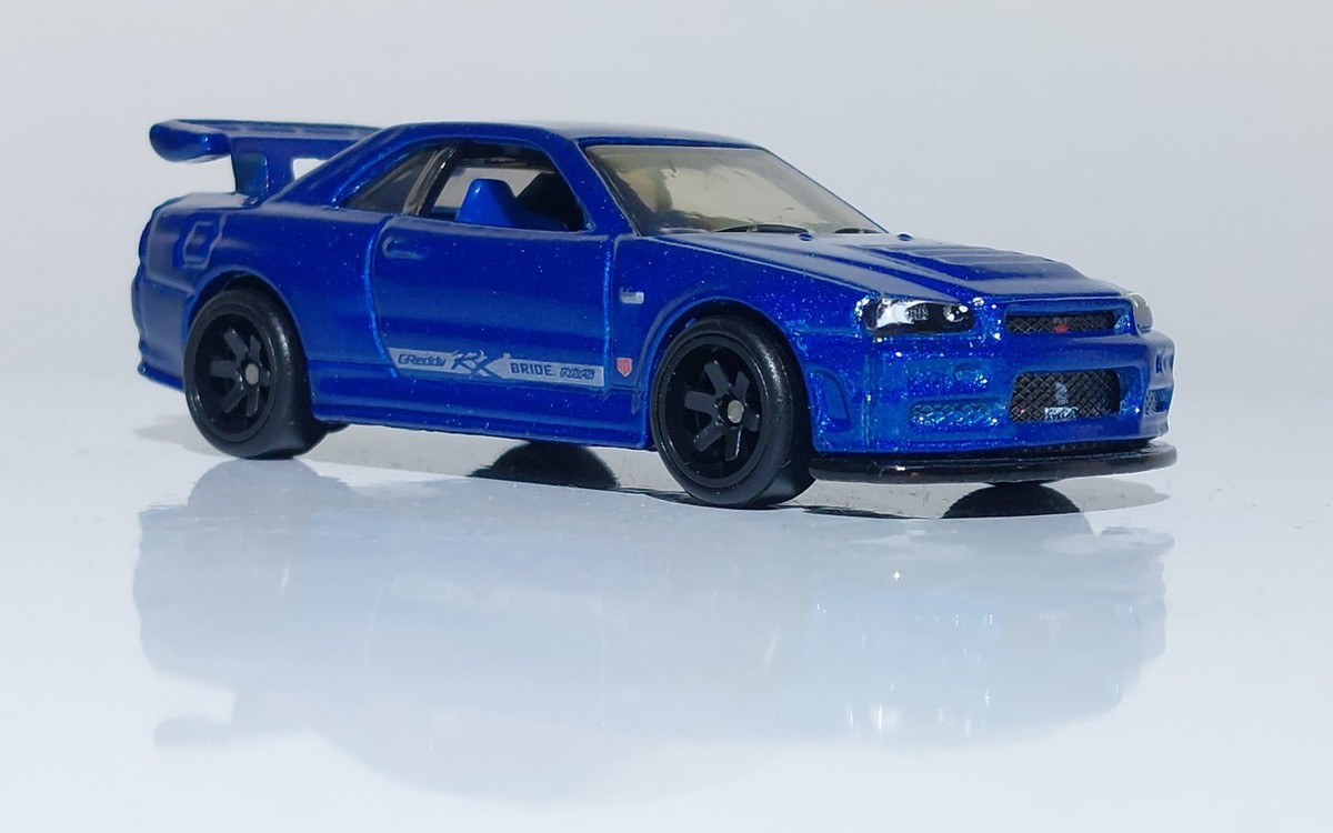 Hot Wheels New 2026 Nissan Skyline GT-R34 W/RRs Metal Base Read
