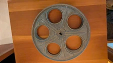 empty 35mm movie reel , unmarked, 10"