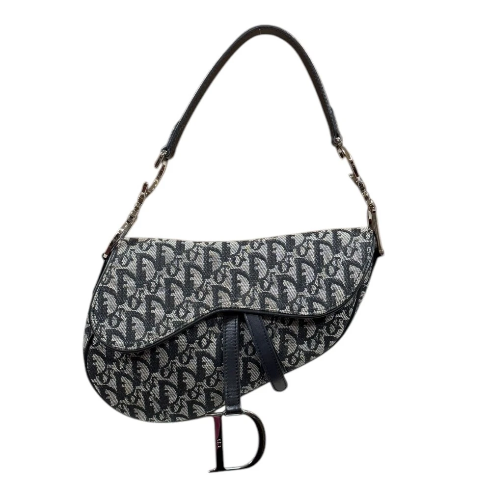 Sac à main Dior toile cuir trotteur selle bag occasion