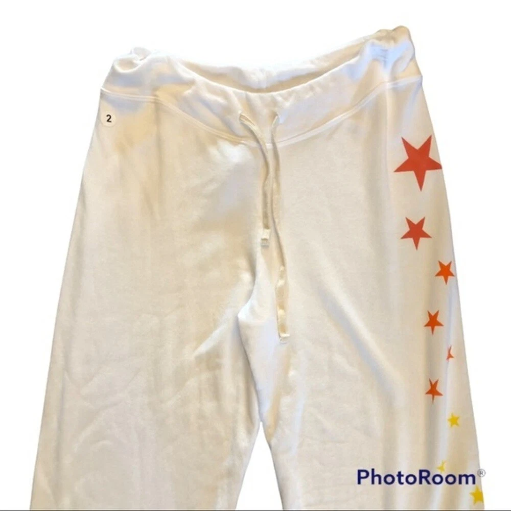 Yellow sweatpants with shop white stars