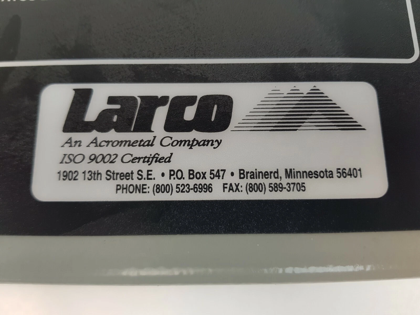 Larco, an Acrometal company, ISO 9002 certified logo plate on the 5000EX front