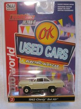 AUTO WORLD OK USED CARS THUNDER JET ULTRA G 62 CHEVY BEL AIR TAN slot car