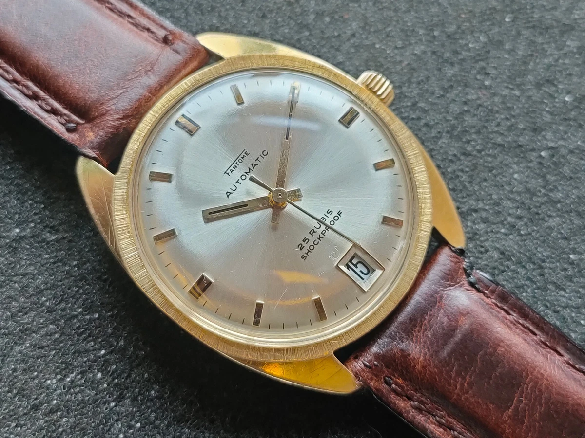 Montre outlet automatique ancienne