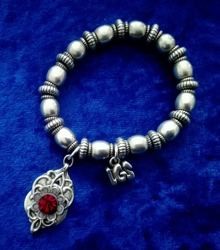Bijou BRACELET LGS LES GENS DU SUD métal argenté breloque pierre rouge - Photo 1/4