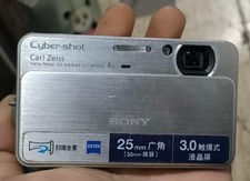 Sony Cyber-shot DSC-T99 14.1MP Digital Camera Carl Zeiss 4x Zoom