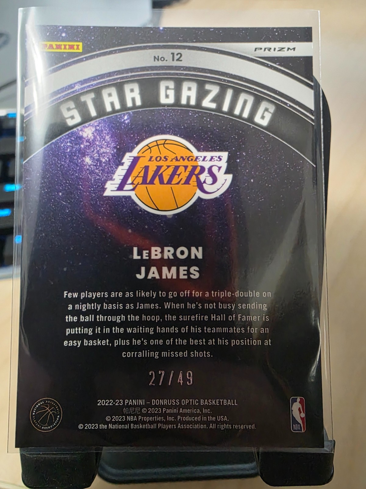 2022-23 Panini Donruss Optic Star Gazing #12 LeBron James 27/49 Blue Holo Prizm