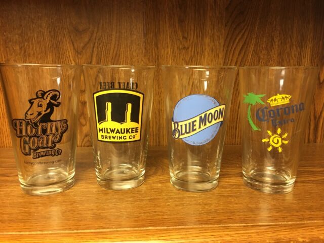 A group of 4 COOL pint glasses