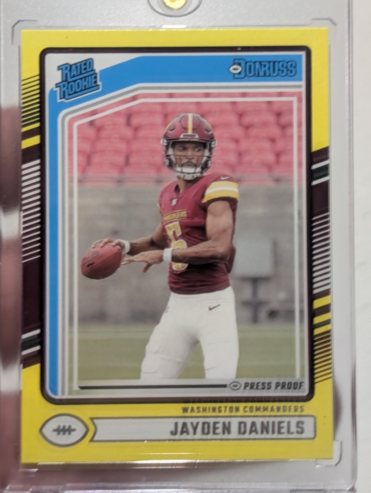 2024 Panini Donruss - Rated Rookie Jayden Daniels #389 Press Proof Yellow (RC)