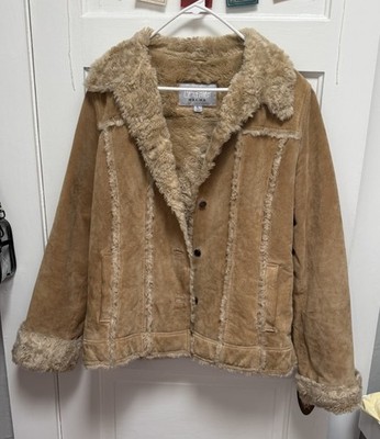 Wilson s Leather tan leather jacket with fur trim. Size Large