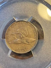 PCGS AU53 1857 FLYING CENT SNOW-16 DIE CUD ON WING. VERY NICE COLOR