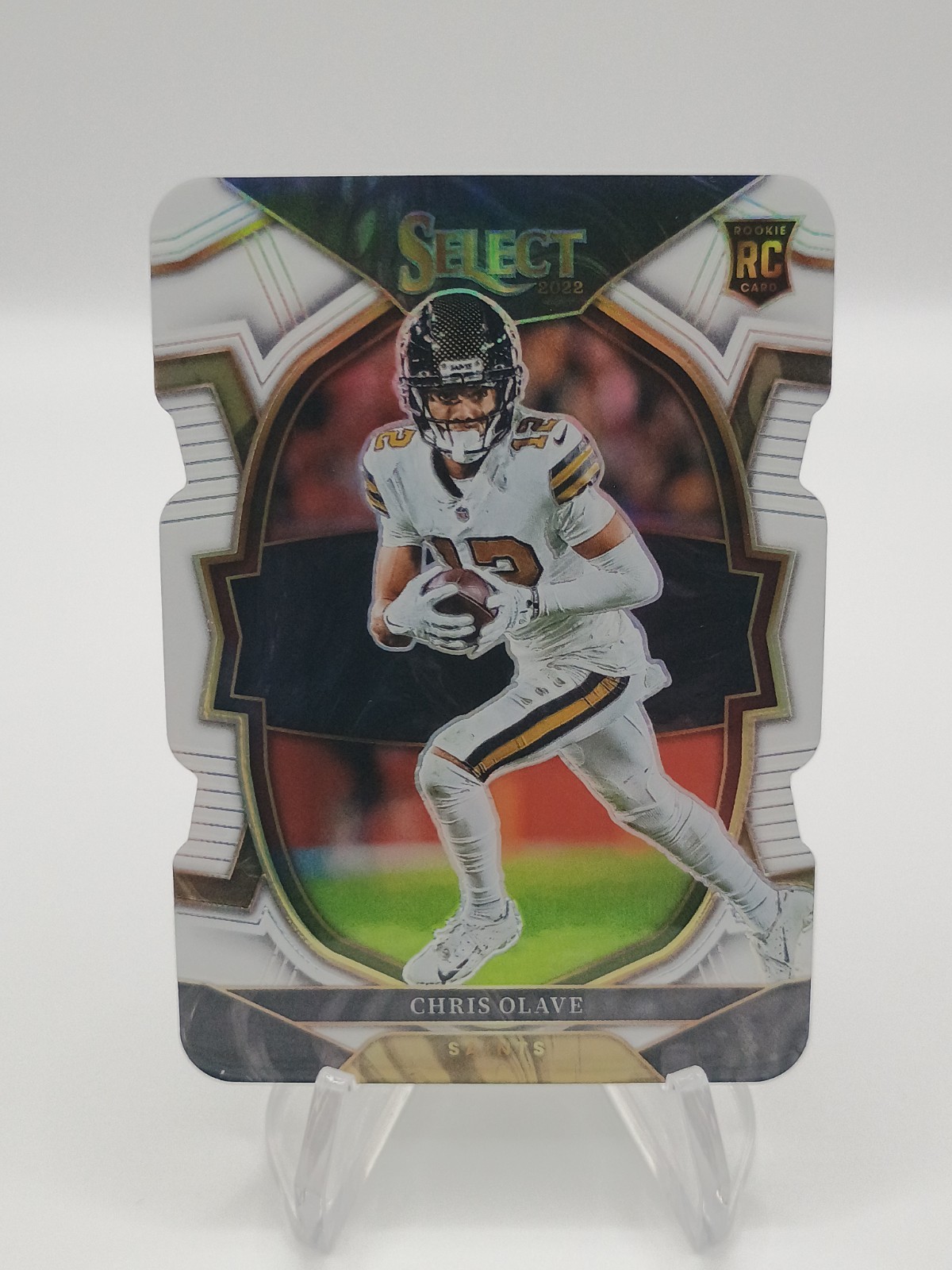 2022 Panini Select - Concourse Chris Olave #30 White Prizm Die-Cut /99 (RC)