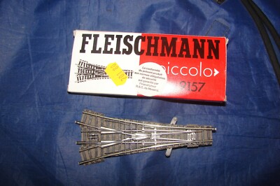 FLEISHMANN 6157 - Aiguillage triple PROFI HO avec agrafes pour continuité liaison électrique + 2 moteurs 644210 neufs en boiteteurs - Modélisme