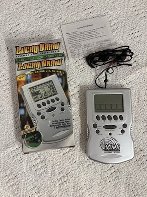 Lucky Draw Electronic Casino Handheld w/ FM Radio Headphones New in Box