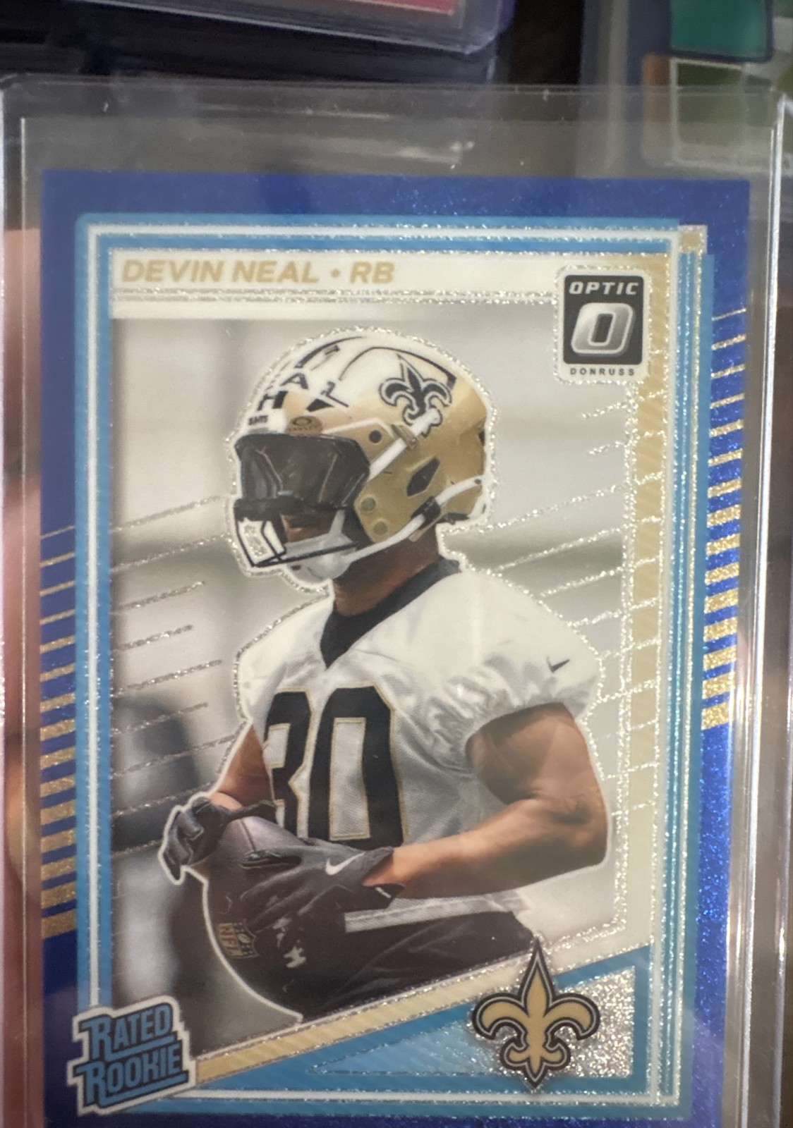 2025 Panini Donruss Optic - Rated Rookie Devin Neal #282 Blue Glitter Prizm (RC)