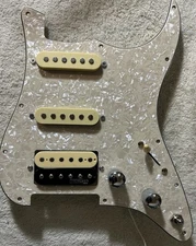 Stratocaster loaded SSH pickguard ceramic neck and middle.