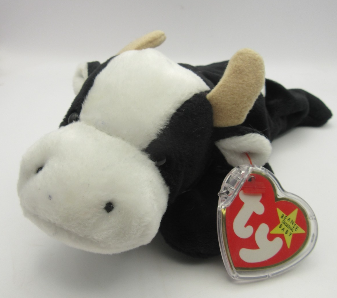 TY BEANIE BABY DAISY - THE  COW - INDONESIA - MINT CONDITION - RETIRED WITH TAGS