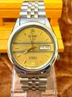 Vintage Seiko 5 Automatic men's wrist watch 7S26 movement Day-Date Golden Dial.