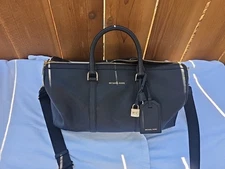 MICHAEL KORS BLACK  LEATHER DUFFER  BAG WITH KEY& LOCK. GOLD METAL. MEN/ WOMEN