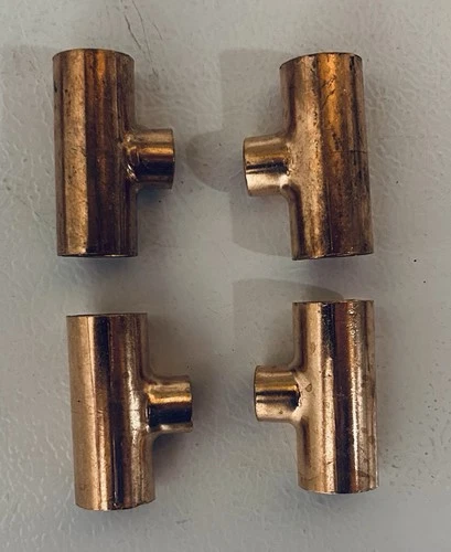 3/4 x 3/4 x 1/2 Sweat Ts. Copper. Quantity of 8.