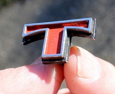1972-1973 AMC JAVELIN SST Interior Door Panel Letter ''T'' Emblem OEM #20257