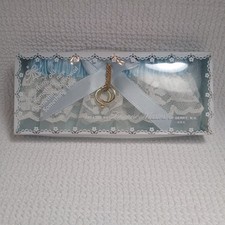 Vintage NOS bridal garter set manufactured by Treasure Masters